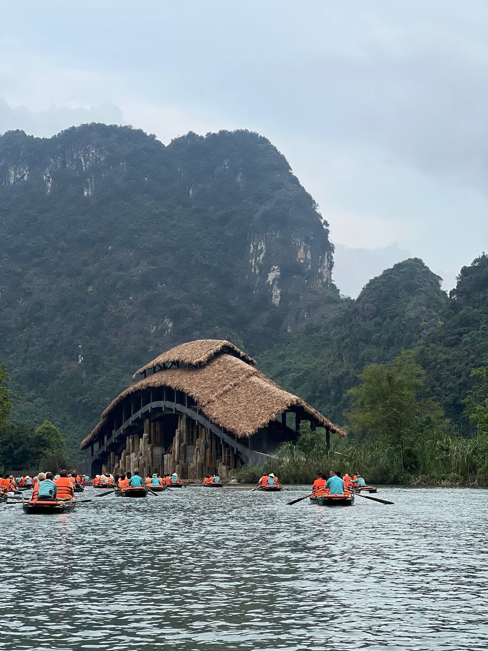 The boats fanning out across the river