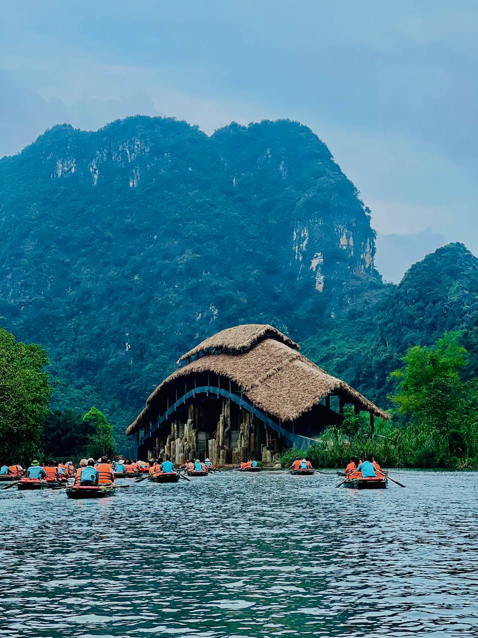 Trang An — the thatched pavilion in the karst landscape